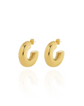 Gold chunky hoop earrings with a glossy finish, designed as bold statement pieces for stylish accessorizing.